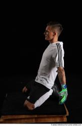 Claudio KNEELING SOCCERPLAYER